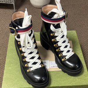 Gucci Black and White Lace-Up Boots with Gold Accents